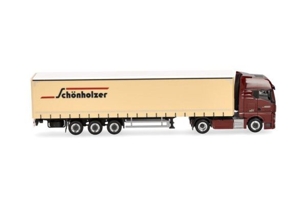 HER962216 - MAN TGX GX 4x2 con remolque de 3 ejes SCHONHOLZER - 1