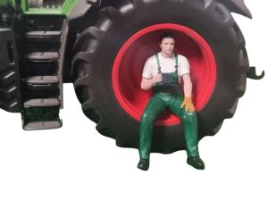 ATLAN32025_VERT - Hombre sentado en pausa verde