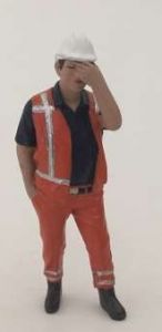 ADF32143 - Personaje de construcción sosteniendo su cabeza.
