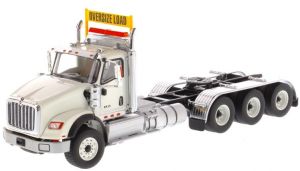 DCM71007 - INTERNATIONAL HX620 Day Cab Tridem blanco