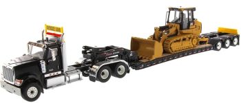DCM85599 - Remolque portamáquinas INTERNATIONAL HX520 6x4 negro y XL120 con toro CATERPILLAR 963K incluido