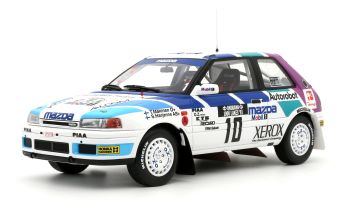 OT1099 - MAZDA 323 GTX GR.A #10 1000 Lakes Rally 1991 T.MÄKINEN